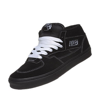 Black vans hotsell with white stitching