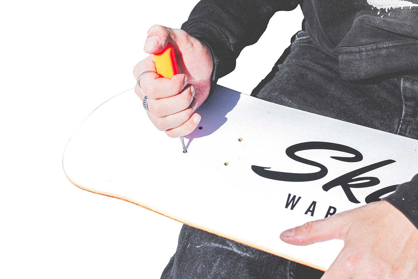 How to Apply Griptape to a Skateboard Deck