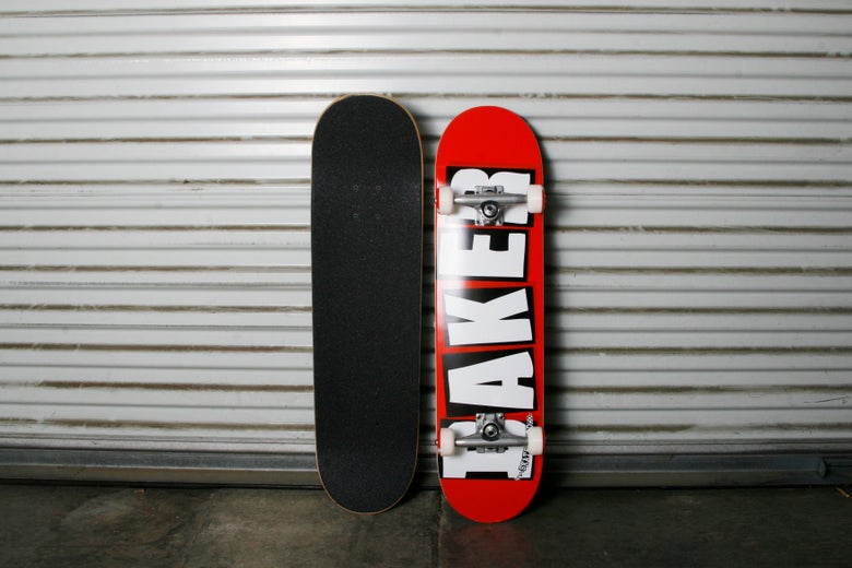 The griptape side and graphic side of a Baker pre-built complete skateboard.