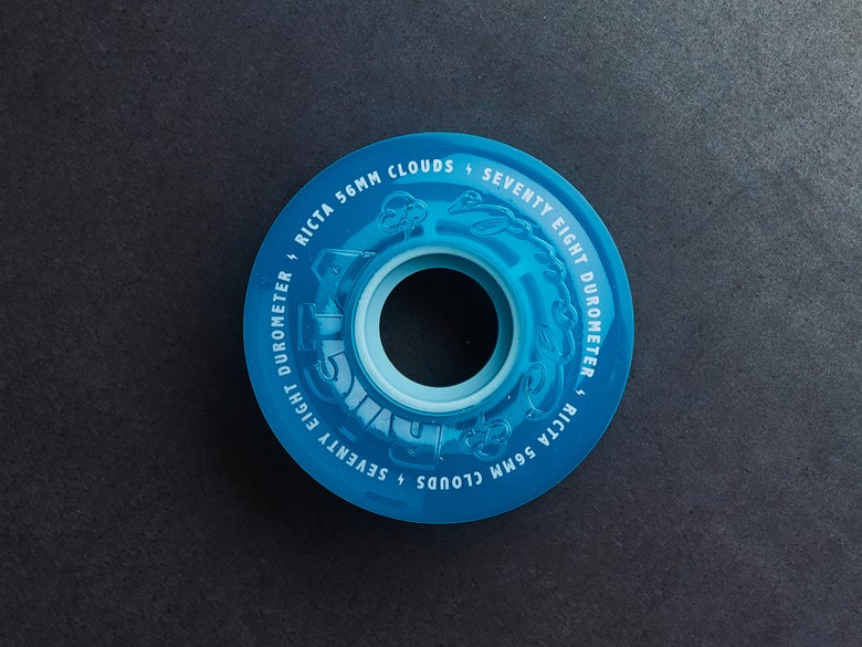 A translucent blue Ricta Cloud skateboard wheel.