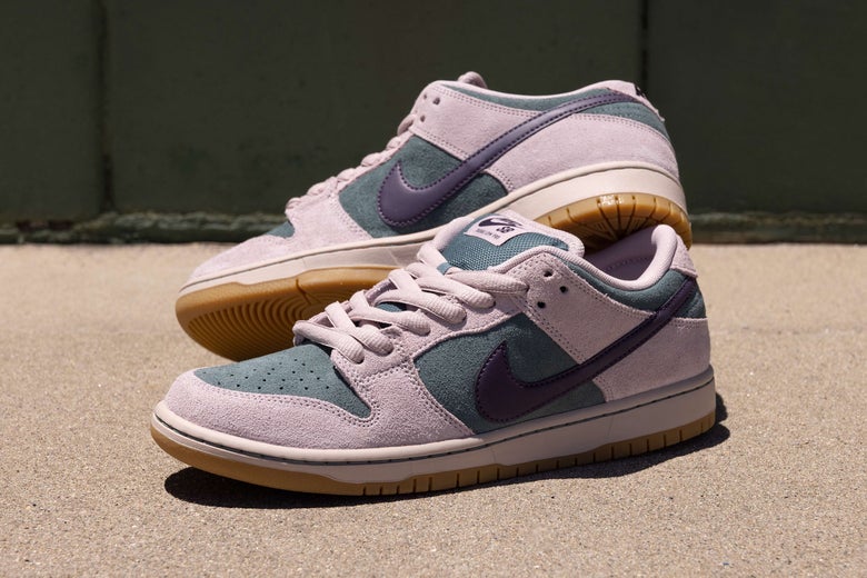 Nike SB Dunk Low Pro shoes, leaned up against a wall.